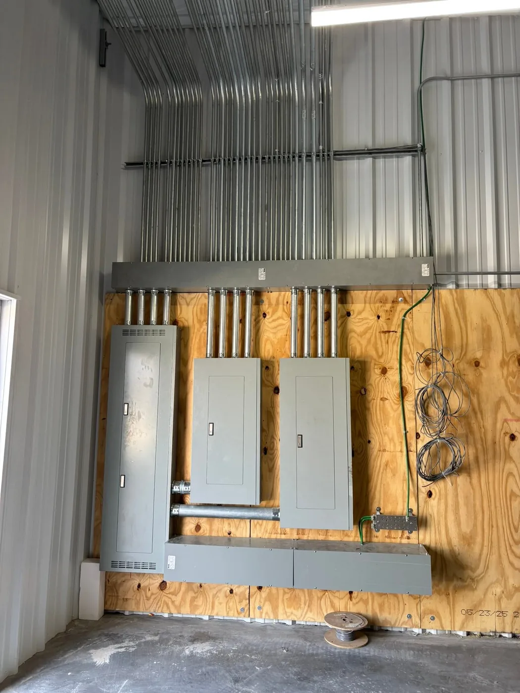 A new electrical panel mounted and wired on plywood